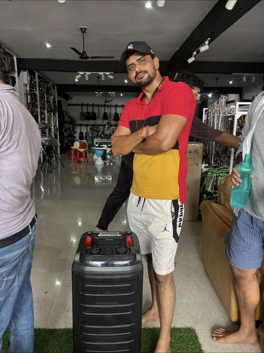 Happy customer with party speaker
